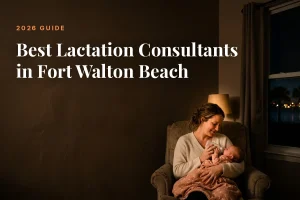 Mother feeding her baby at home in Fort Walton Beach at night, cover image for the Betteroo guide to the best lactation consultants in Fort Walton Beach in 2026
