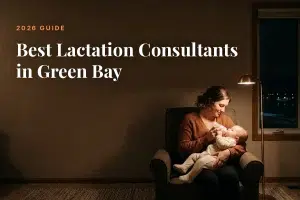 Mother feeding her baby at home in Green Bay at night, cover image for the Betteroo guide to the best lactation consultants in Green Bay in 2026