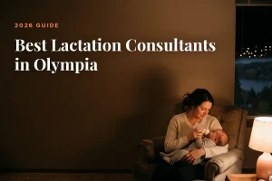 Mother feeding her baby at home in Olympia at night, cover image for the Betteroo guide to the best lactation consultants in Olympia in 2026