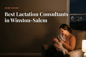 Mother feeding her baby at home in Winston-Salem at night, cover image for the Betteroo guide to the best lactation consultants in Winston-Salem in 2026