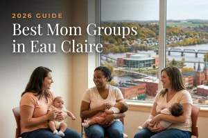Best mom groups in Eau Claire, WI: three moms holding their babies at an Eau Claire new-parent meetup