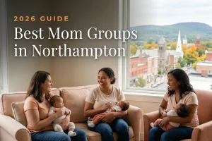 Best mom groups in Northampton, MA: three moms holding their babies at a Northampton new-parent meetup