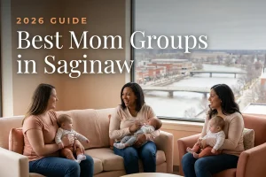Best mom groups in Saginaw, MI: three moms holding their babies at a Saginaw new-parent meetup